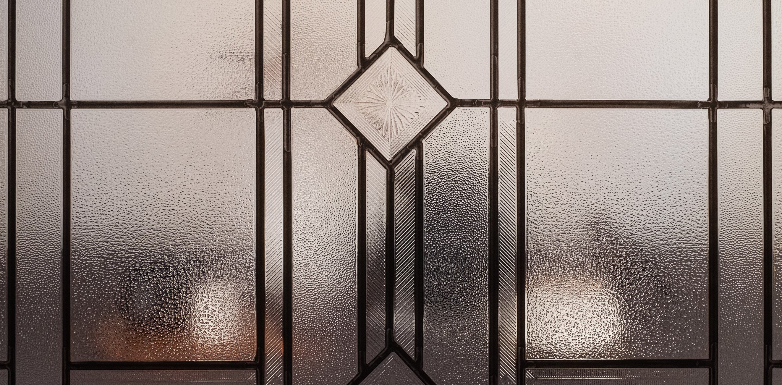 An image of a still life setting, obscured by the Vienna window film in order to exhibit the privacy level of the selected film.