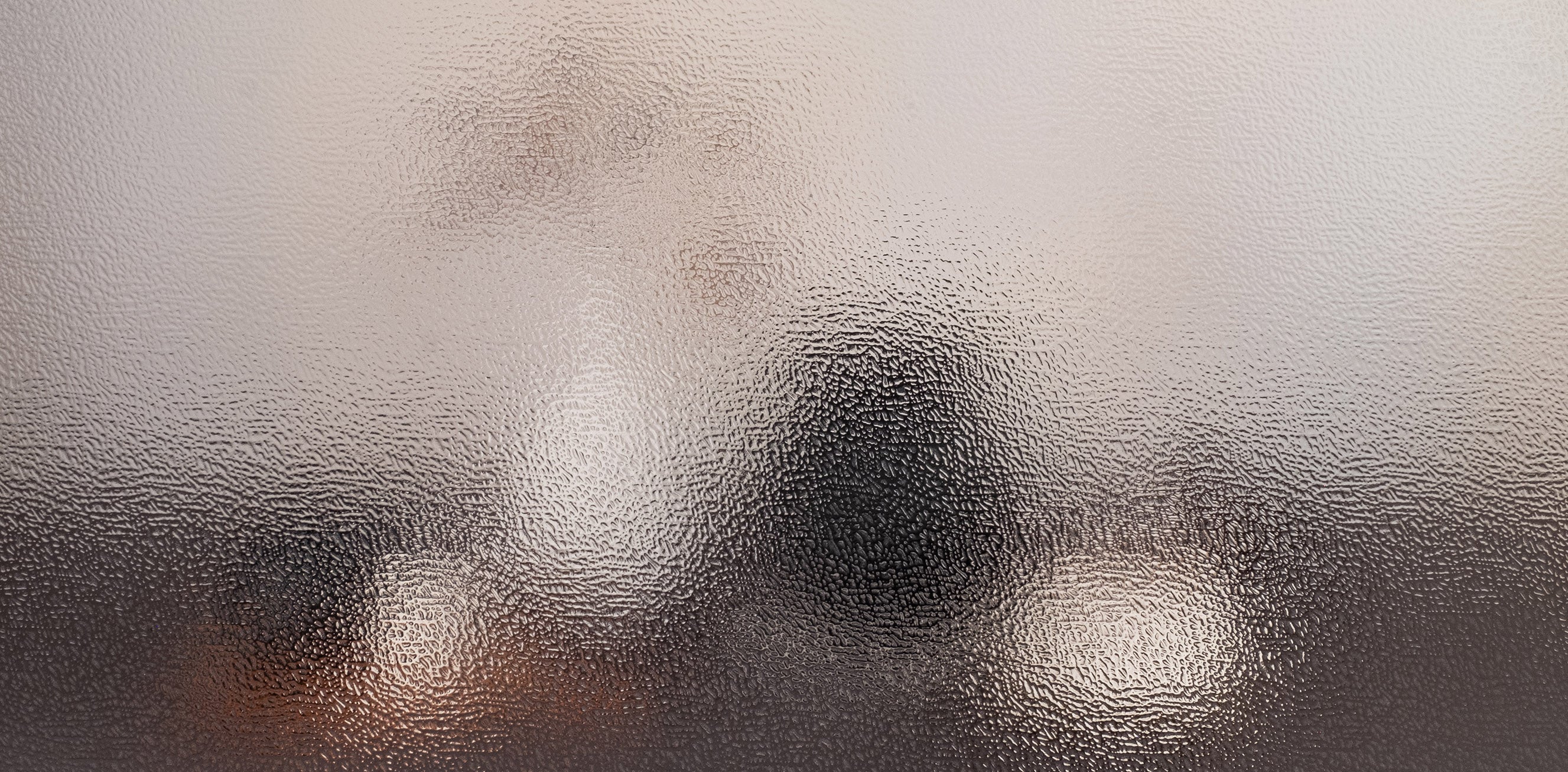 An image of a still life setting, obscured by the Texture Twelve window film in order to exhibit the privacy level of the selected film.