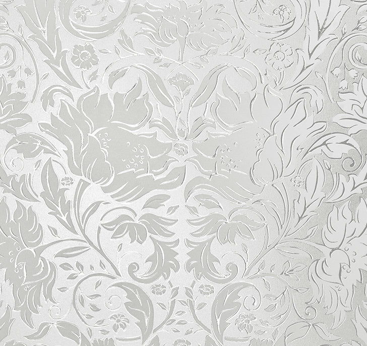 A close-up detail image of the Windsor window film by Artscape, a classic and elegant floral design that looks like etched and textured glass. 