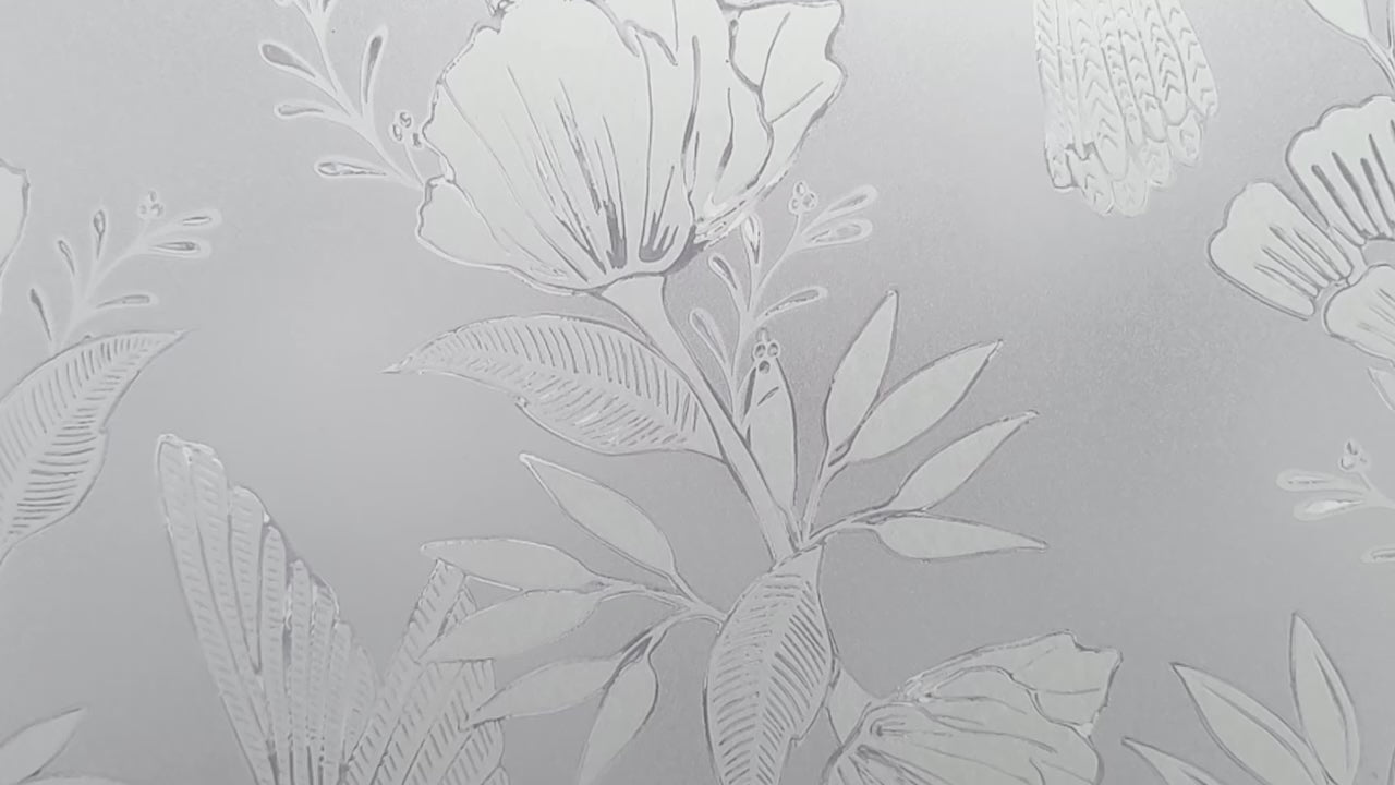 Video moving over close-up of Artscape Anna Decorative Privacy Window Film with Twisting Vines/Hummingbirds design.