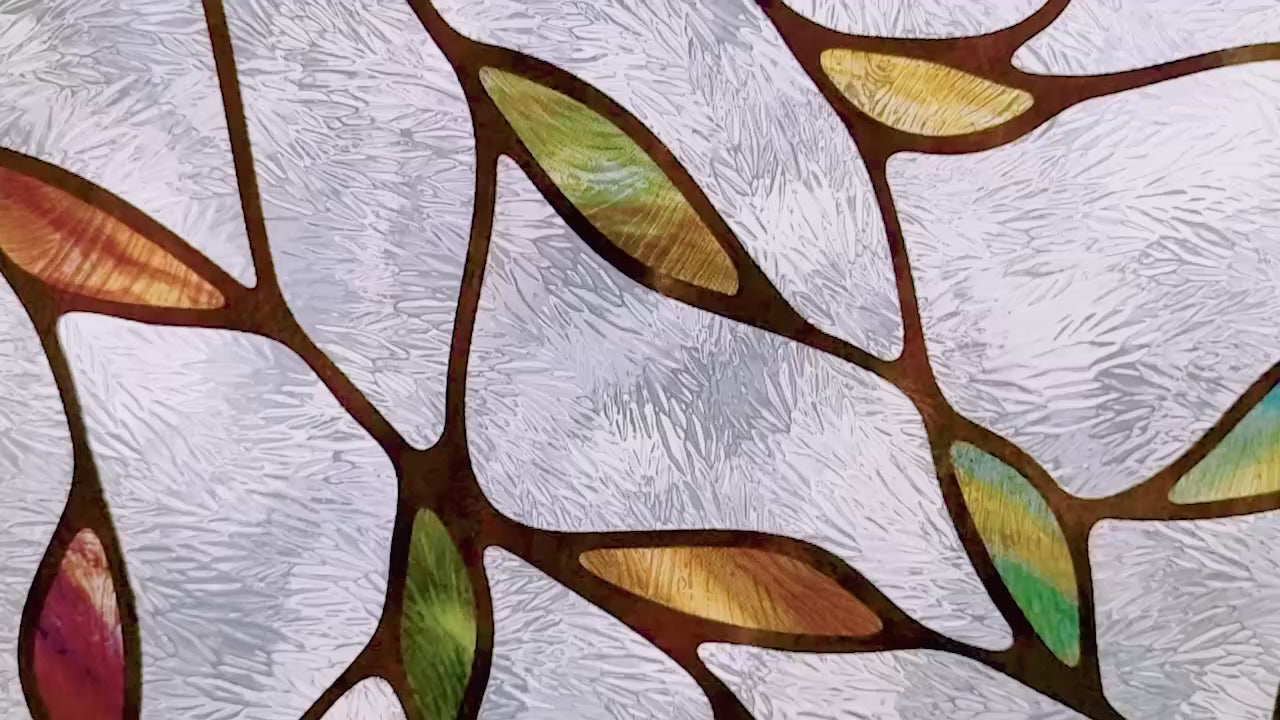 Video  moving over close-up of Artscape Cascade Sidelight Decorative Privacy Window Film showing colorful design.