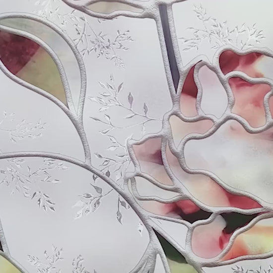 Video moving over close-up of Artscape Begonia Decorative Privacy Window Film with larger scale floral design and colorful bouquets.